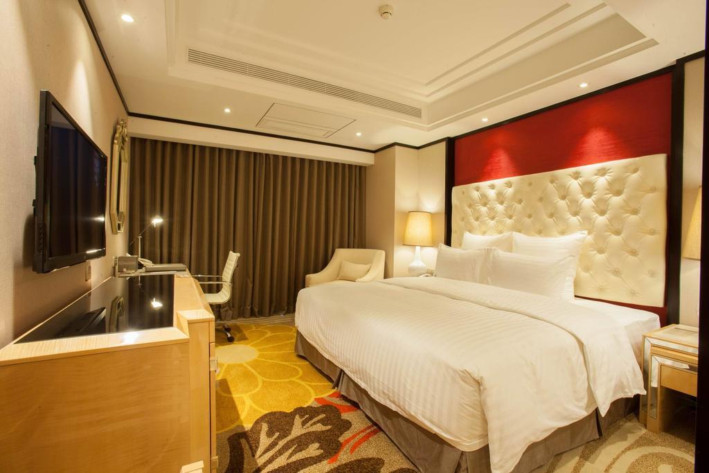 Nanning Landmark Hotel Quarto foto